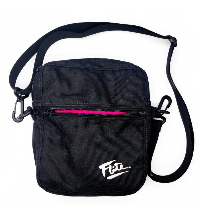 Black cross body sport bag for men with hot pink contrasting lining by Flite