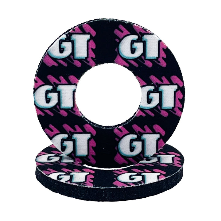 GT Freetyle Grip Donuts Black with White logo Pink background Sold in pairs